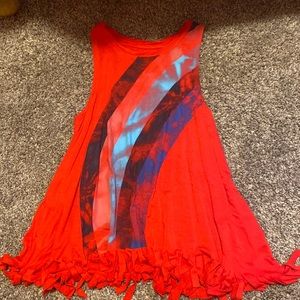 This red white and blue shirt is size Large 10/12 and the brand is falls creek